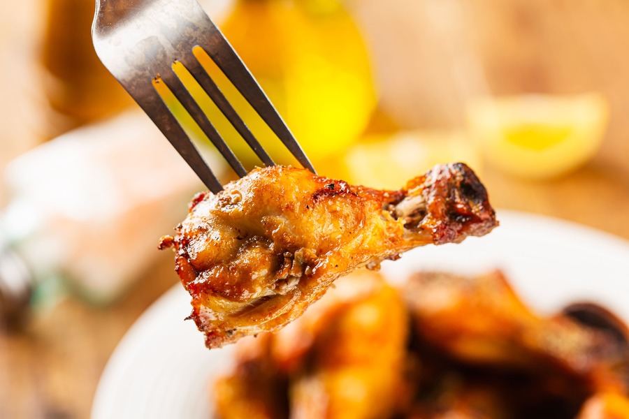 Korean fried chicken on a fork